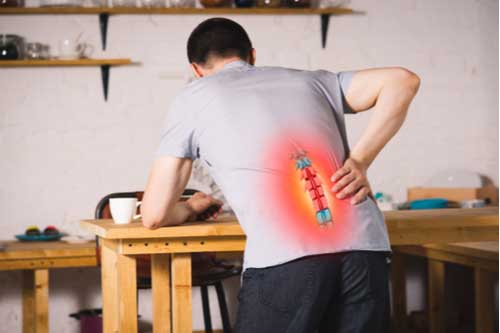 Patient feeling pain because spine problems