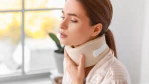 a woman suffering neck injury at Cape Coral